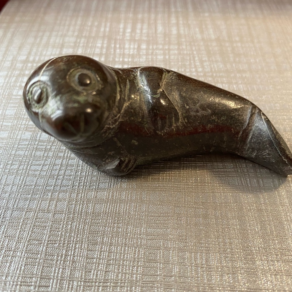 Seal rock carving